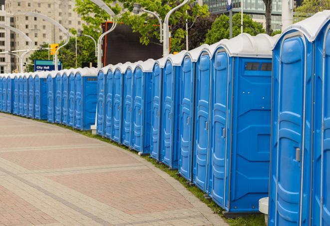 outdoor restroom setup for a special event, with sleek and modern portable restrooms in Adkins, TX